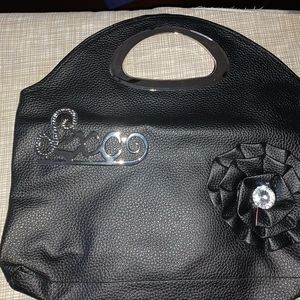 Black Purse with Handle with Flower on the side